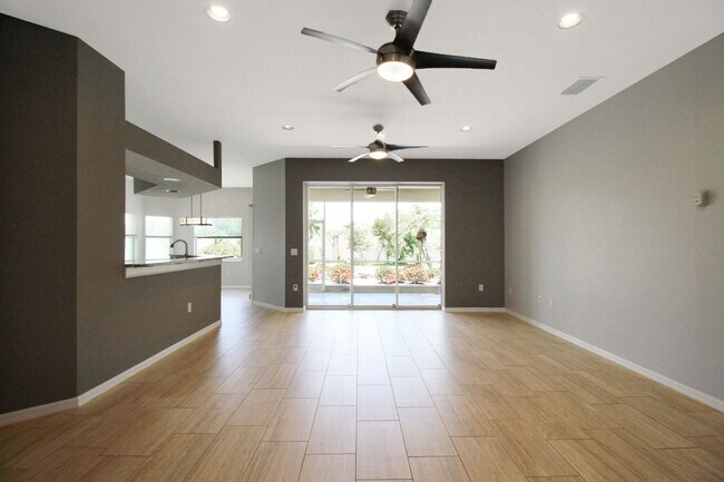 Building Photo - Annual rental: Spacious 3BR/2BA Creekwood Home with Office, Screened Lanai, EV Charger & Resort-S...
