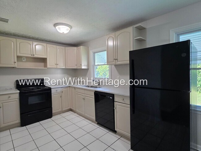 Building Photo - 5990 Peco Ln