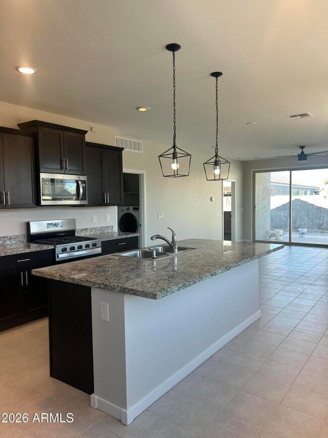 Building Photo - 40342 W Sunland Dr