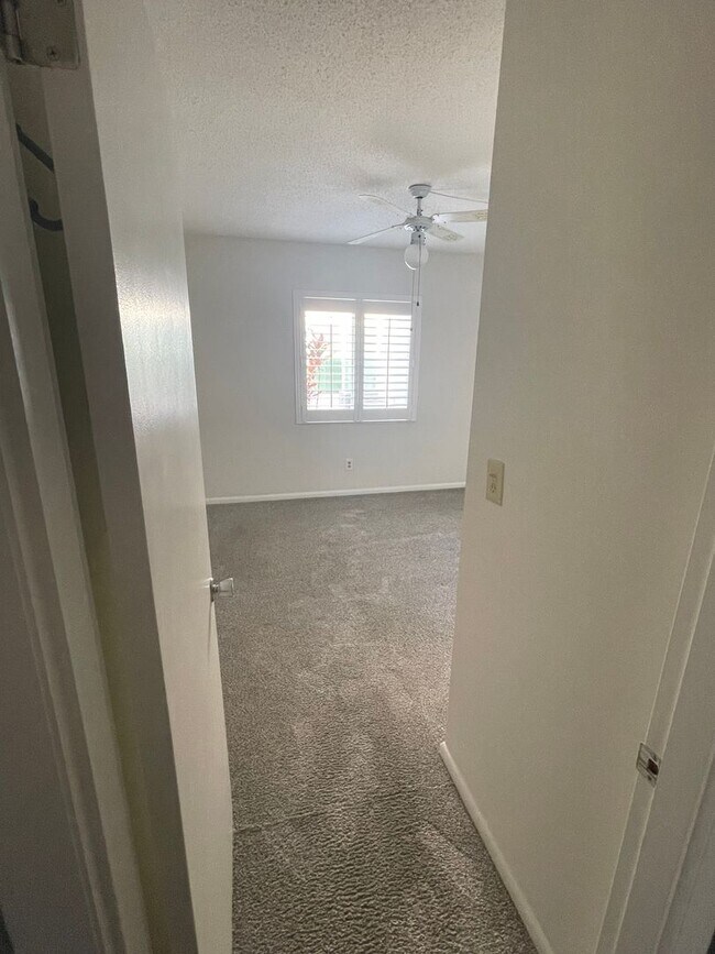 Building Photo - 55+ Charming first-floor condo nestled in the serene Fairways 3 Condominiums