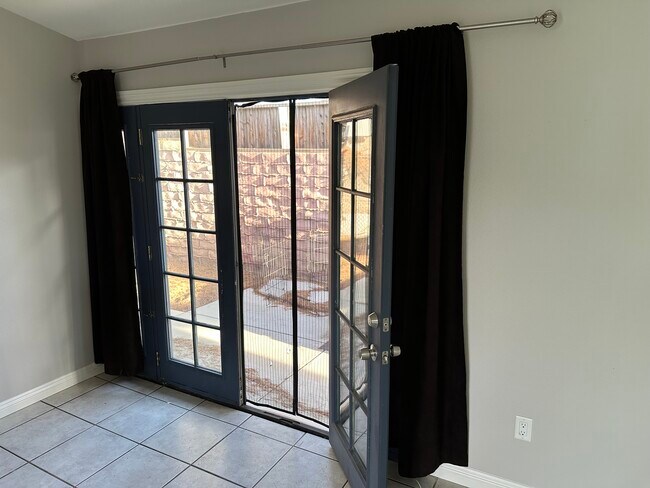 French doors open to back patio - 12020 Neenach St