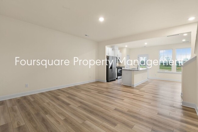 Building Photo - Townhome! | Back Patio with Privacy Fence|...