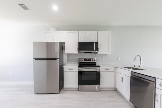 Building Photo - BRAND NEW Construction, 3 bed / 2 bath Rent-Ready Home in Port Charlotte!