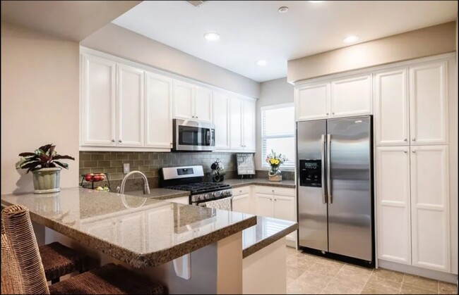 The kitchen features ample storage - 5429 Strand