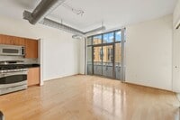 Building Photo - Madrigal Lofts in Mt Vernon Triangle | 2 Bed | 2 Bath | 920 Sf | Balcony | 1 Garage Parking Space