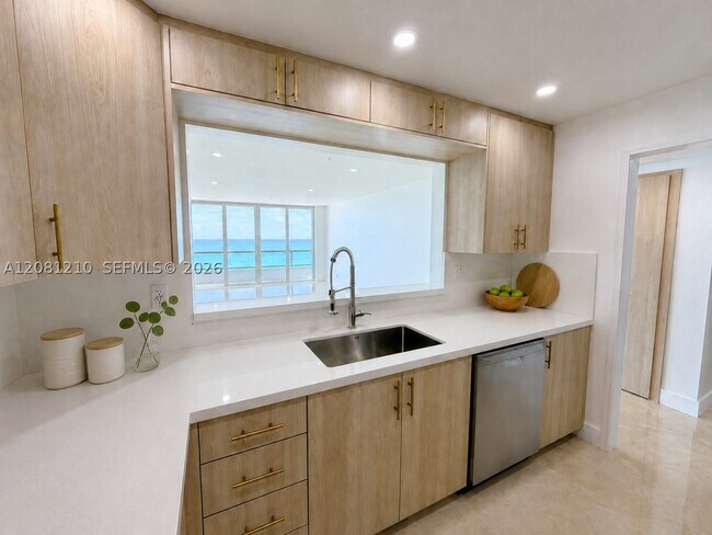 Building Photo - 5601 Collins Ave