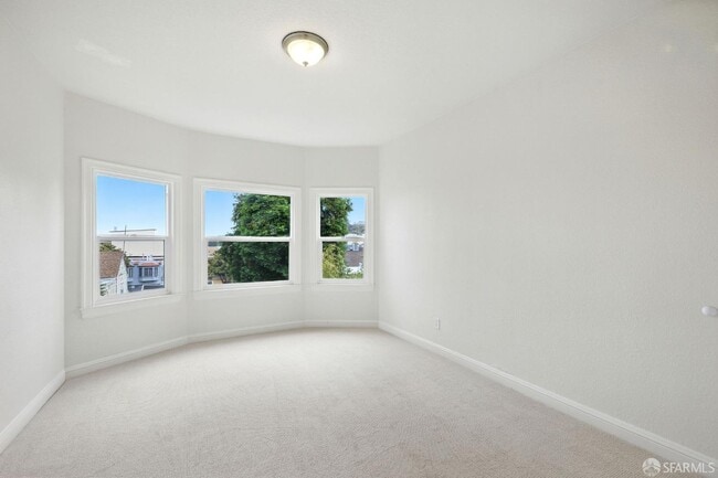 Building Photo - 1720 Quesada Ave