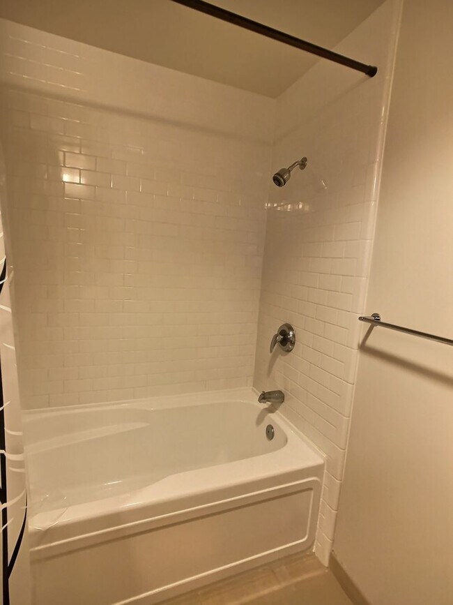 Building Photo - Luxury 1 Bedroom Condo at Axis – with Outdoor Patio Space!