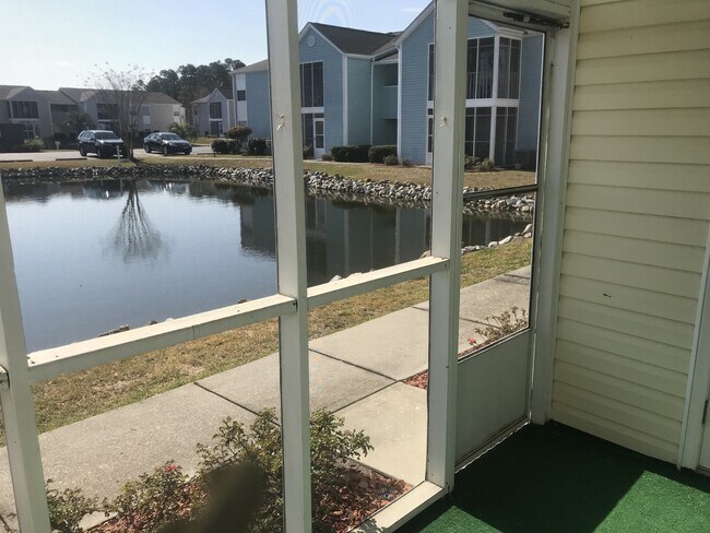 Building Photo - FIRST FLOOR, SURFSIDE BEACH THREE-BEDROOM CONDO, AVAILABLE SOON!!