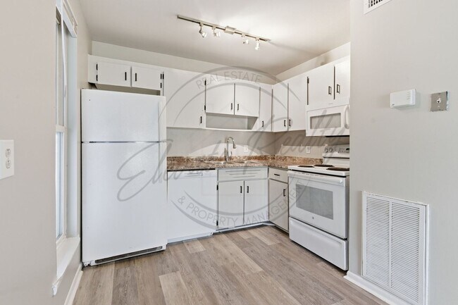 Building Photo - SPRING SPECIAL!! FIRST MONTH FREE on this ONE Bedroom Condo, First Floor, across from Madison Park!