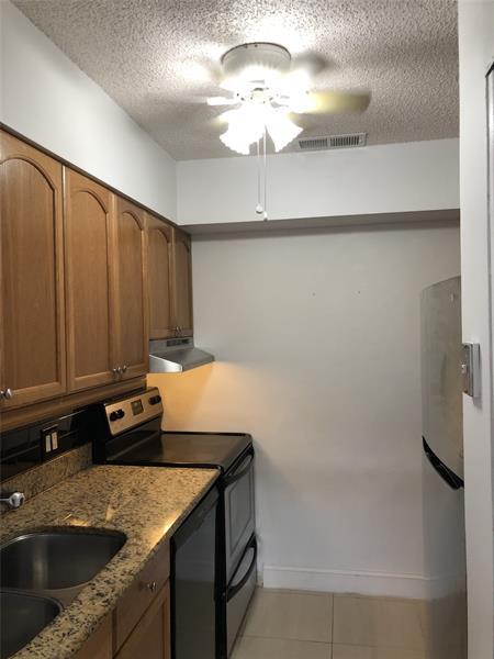 Building Photo - 9800 NW 16th Ct