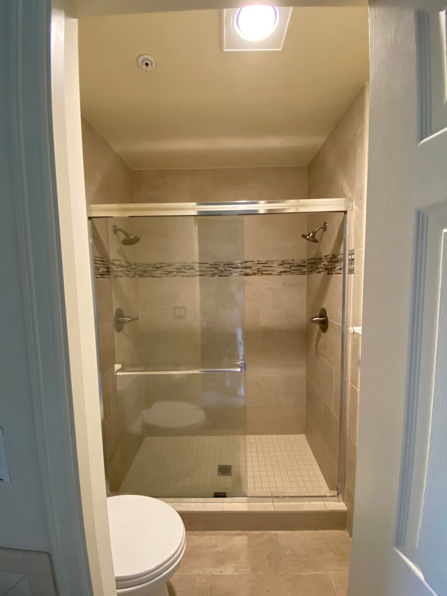 Tiled shower - 10042 Main St