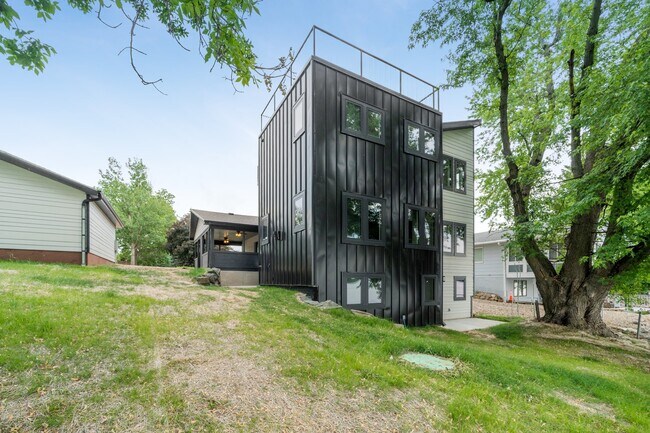Modern Exterior + roof patio - 26539 E Shore Pl