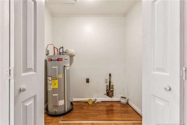 Building Photo - 6837 Woodmark Dr