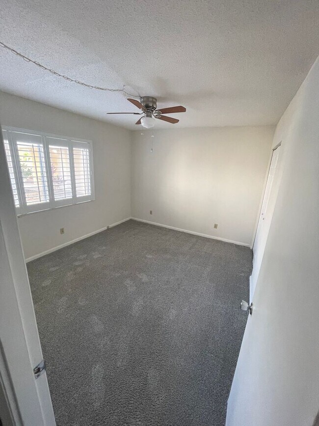 Building Photo - 55+ Charming first-floor condo nestled in the serene Fairways 3 Condominiums