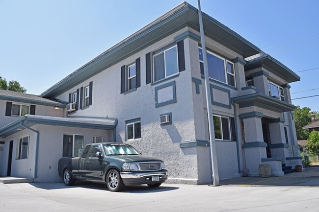 Building Photo - Near Hospitals: Furnished Studio with Cable TV and Free Laundry