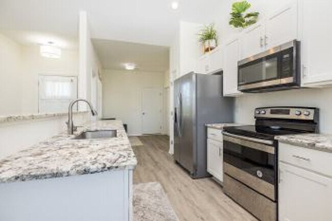 Building Photo - Creekside at Aragona Village