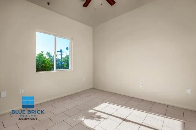 Building Photo - 5869 S Figueroa St