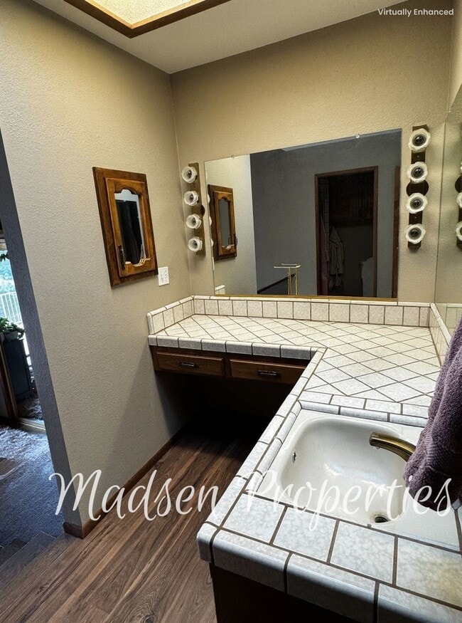 Building Photo - 6367 Woodman Dr