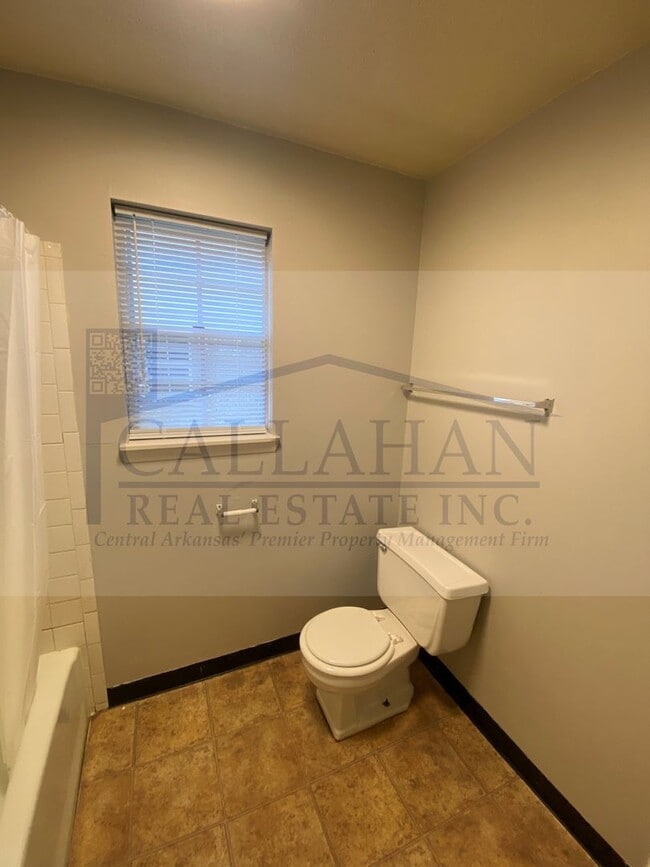 Building Photo - 8211 Woodview Dr N