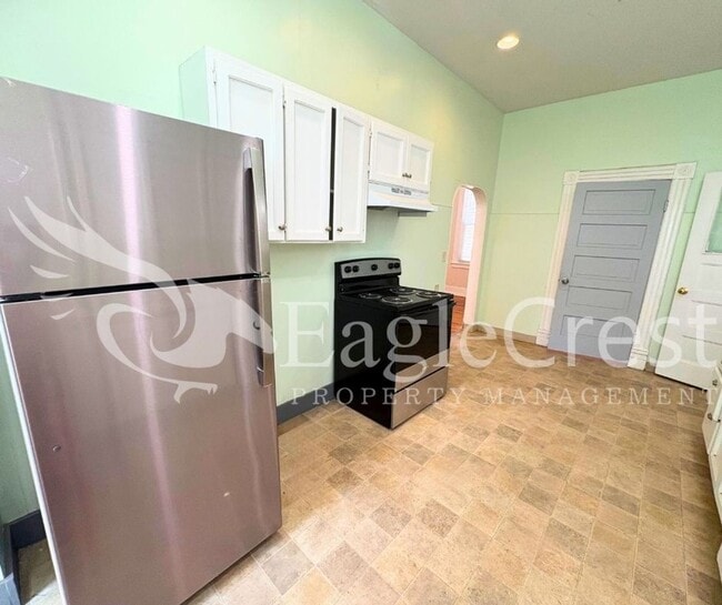 Building Photo - Charming Historic 4-Bedroom Home with Fenced Yard & Chicken Coop