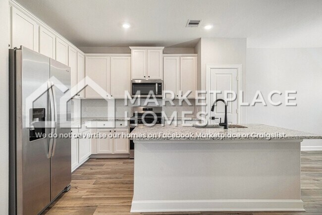 Building Photo - 6107 White Spruce Dr