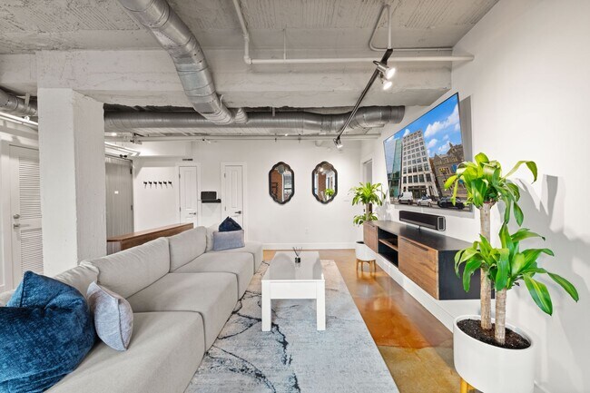 Building Photo - Fully Furnished Designer Loft with Parking & Monument Views!