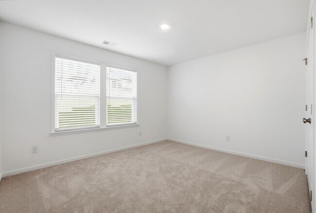Building Photo - Brand-New Townhome in the University area at Senata at Research Park!