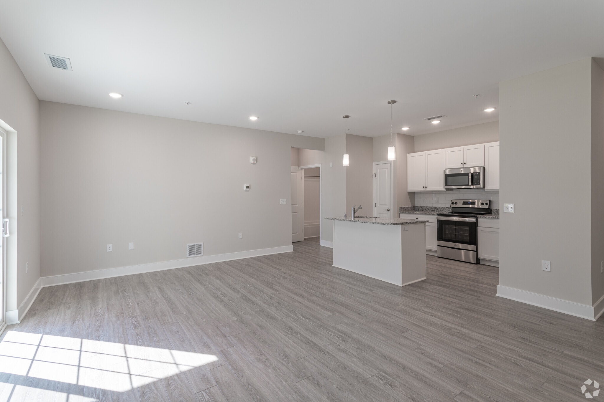 1 BR, 1 BA - 953SF - Living Room - Windward on The River