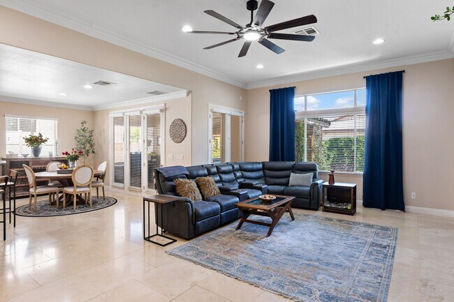 Building Photo - Spacious Mountain’s Edge Home with Den, Sunroom, 3-Car Garage & Private Spa Retreat