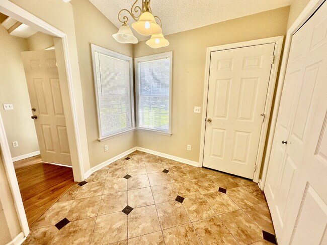 Building Photo - Rivers End Three Bedroom Home with a Fence...