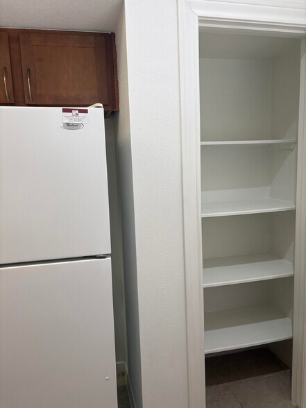 Kitchen with spacious pantry - 2700 Revere St