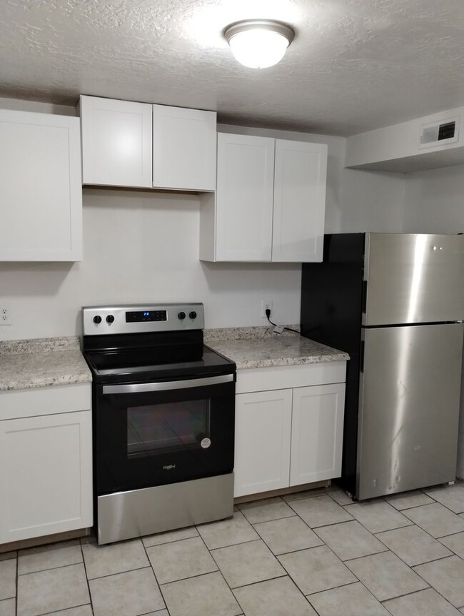 Building Photo - Modern Upgrades in Prime West Valley City ...