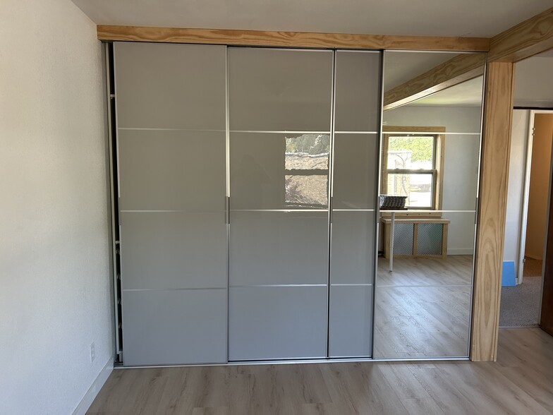 sliding doors with mirrored section - 217 N Franklin St