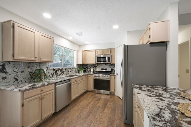 Building Photo - 8910 Driftstone Dr