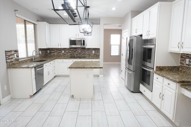 Building Photo - 6700 S Agate Way