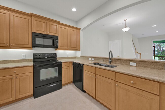 Building Photo - Spacious 3-Bedroom Townhome in the Prestigious Matera Community