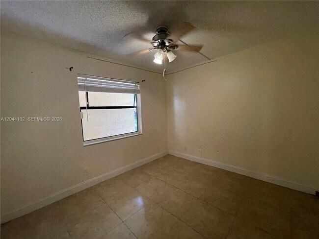 Building Photo - 9044 NW 28th Dr