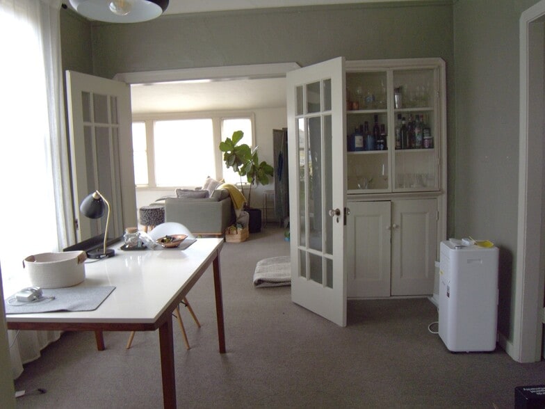 dining room looking into living roomkitchen - 913 Camelia St