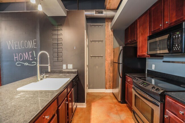 Building Photo - Live in Style at Old Manchester Lofts!