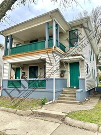 Building Photo - Two Bedroom Upper