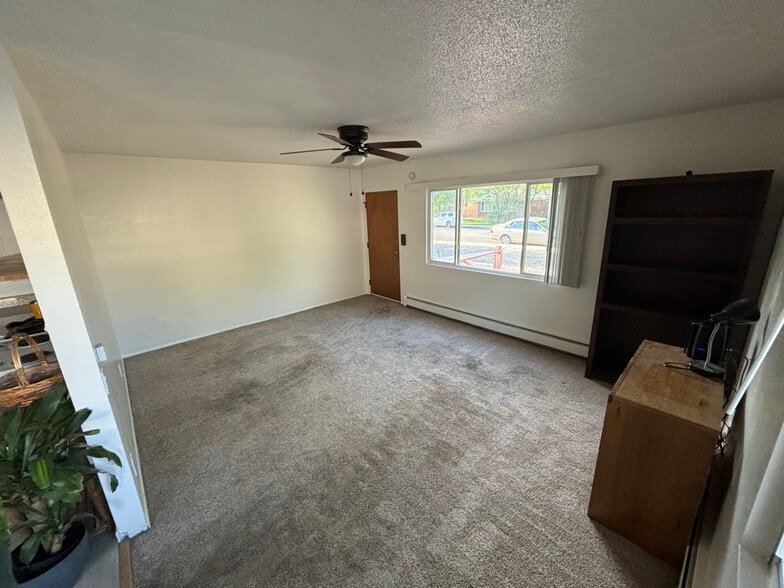 Viewing the front entrance from the kitchen. - 1718 White Ave