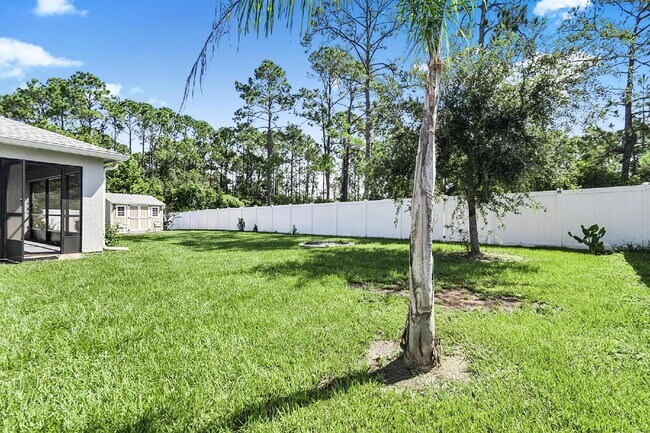 Building Photo - Modern 4-Bedroom, 3-Bath Home with Private In-Law Suite – Palm Coast, FL