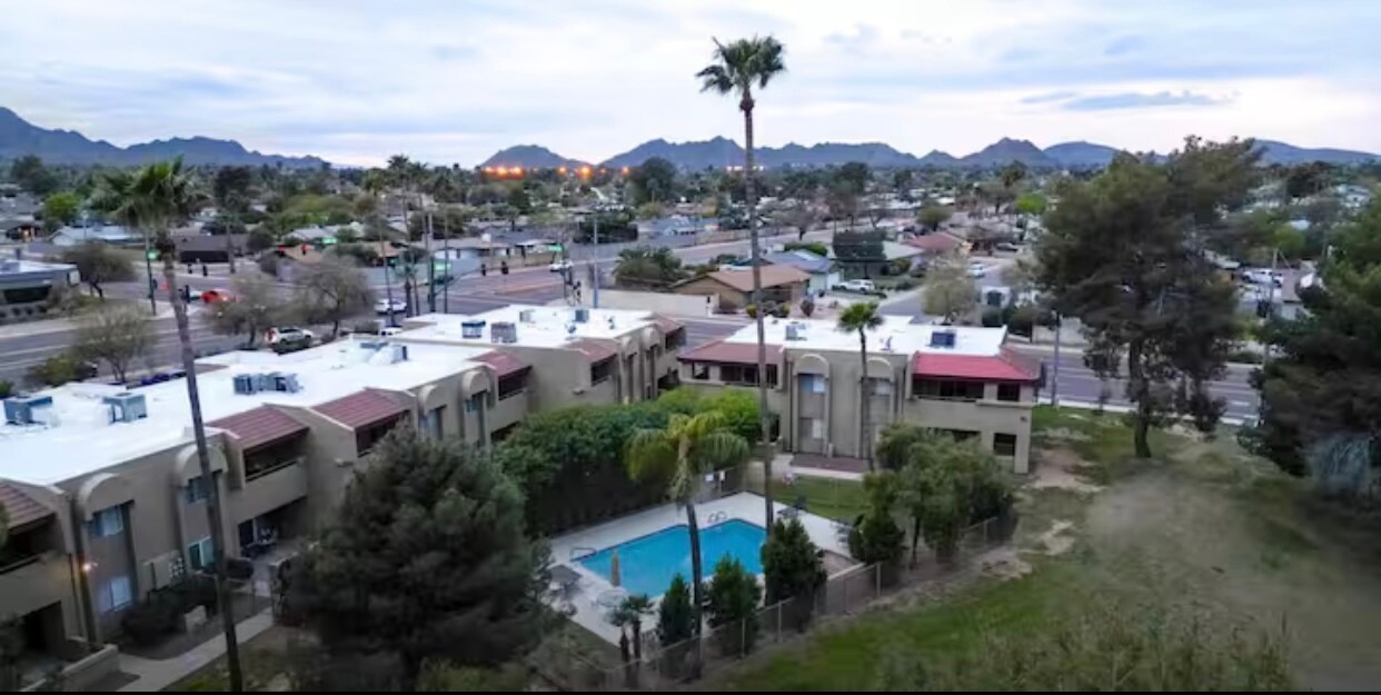 Arial shot of buildings & pool - 4444 E Paradise Village Pky N