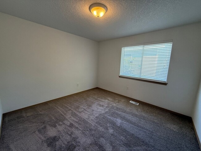 Building Photo - 3 Bed, 2 Bath with Garage, W/D, and Fenced...