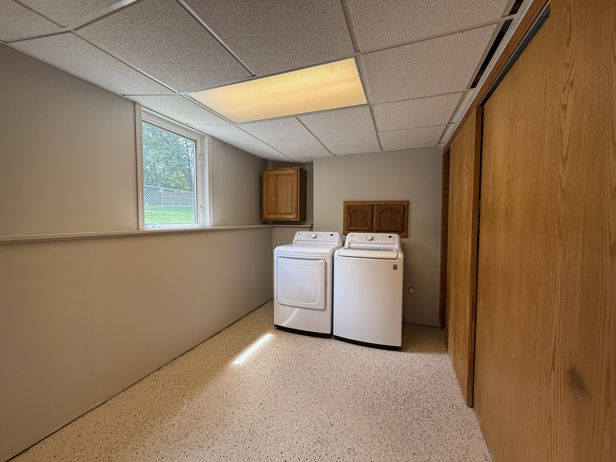 Large laundry room with LG washer and dryer - 2005 S Gordon Dr