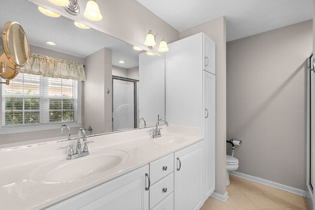 Building Photo - Live the Coastal Lifestyle in This Cypress Keys Beauty!