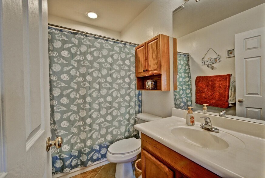Main Level Bathroom - 8617 W Carole Ln