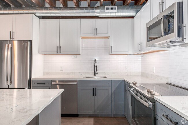 Building Photo - Furnished 1 Bedroom Apartments in Downtown...