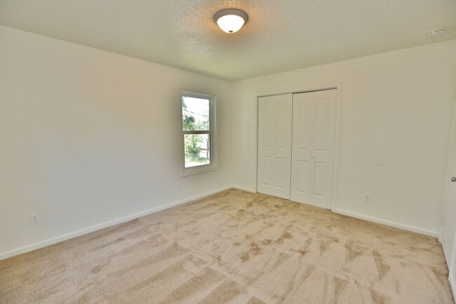 Building Photo - COMPLETELY UPDATED & READY 05-08-26!! 2-Bedroom 2nd Floor Duplex Just Minutes to the Beach!